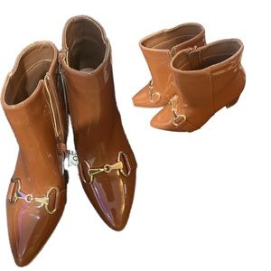 Women’s patent leather booties.